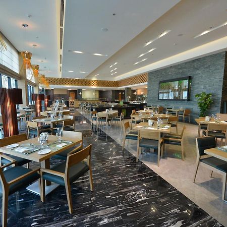 Ramee Grand Hotel And Spa Manama Exterior foto The restaurant